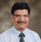 Dr. Anil Baxi